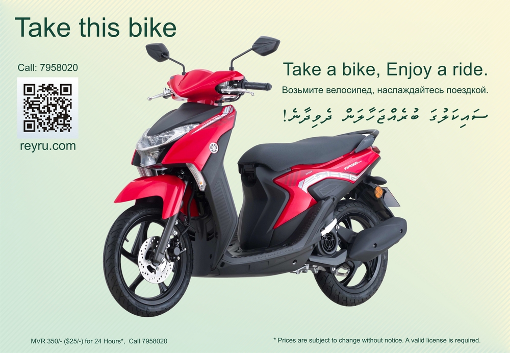 A rental motorbike parked near the beach